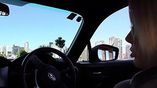 Blonde is flashing her big boobs in the outdoors