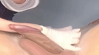 A Nurse in White Gloves Waxes a Guy